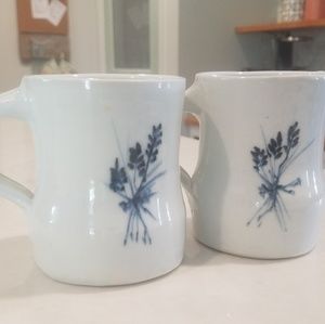 2 vintage blue and white coffee mugs